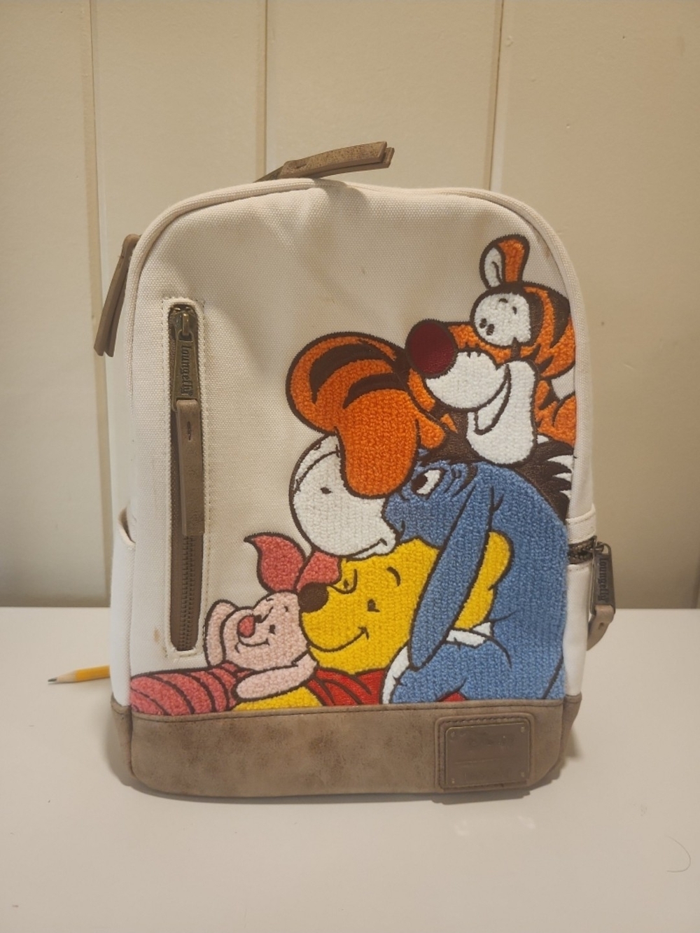 Disney Loungefly SUPER RARE! with Embroidered Winnie the Pooh Characters.